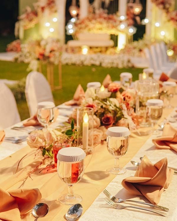 night-dinner-long-table-with-white-table-cloth-and-2025-05-13-10-16-48-VXNJ5PJ