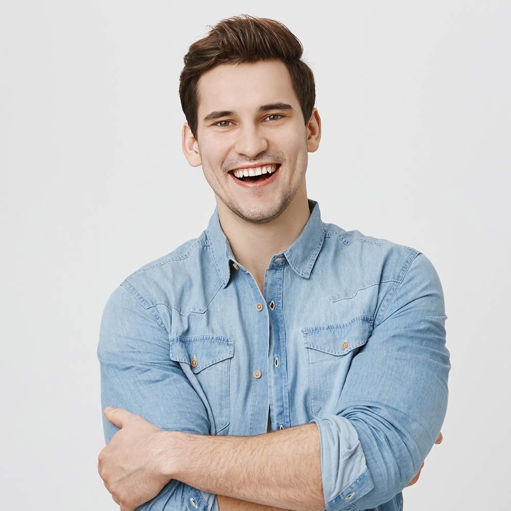 happy-young-man-in-denim-shirt-smiling-2026-01-05-05-47-36-utc